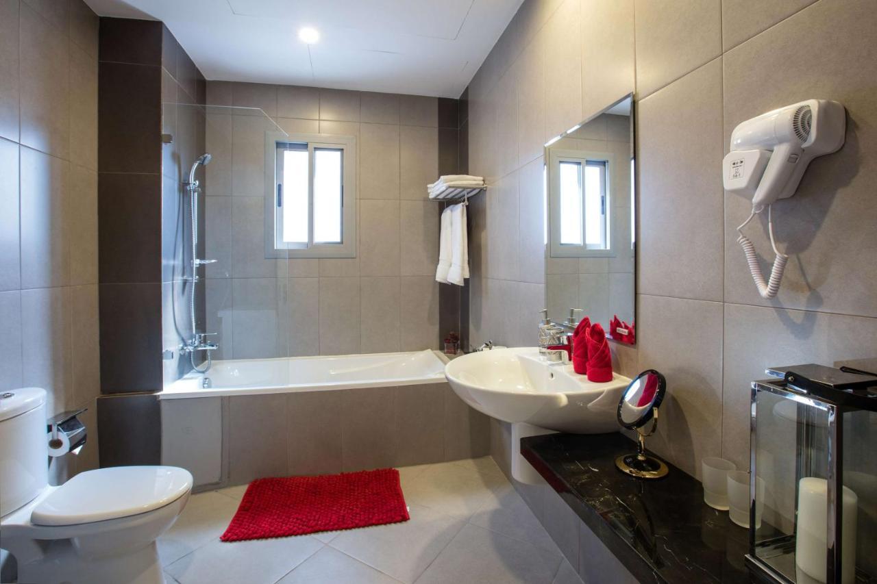 Loumage Suites And Spa Manama Exterior photo