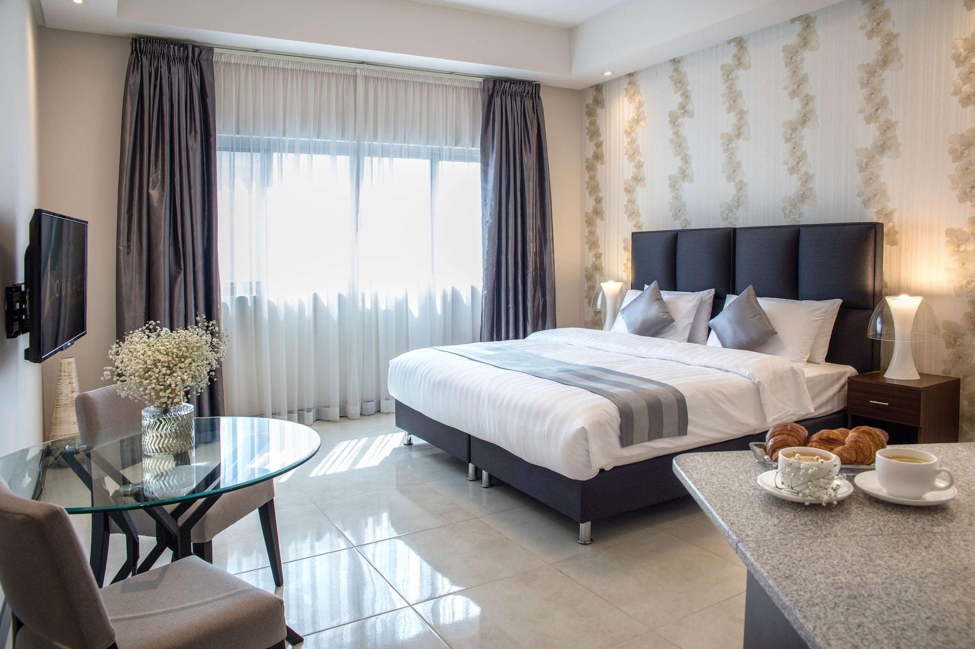 Loumage Suites And Spa Manama Exterior photo