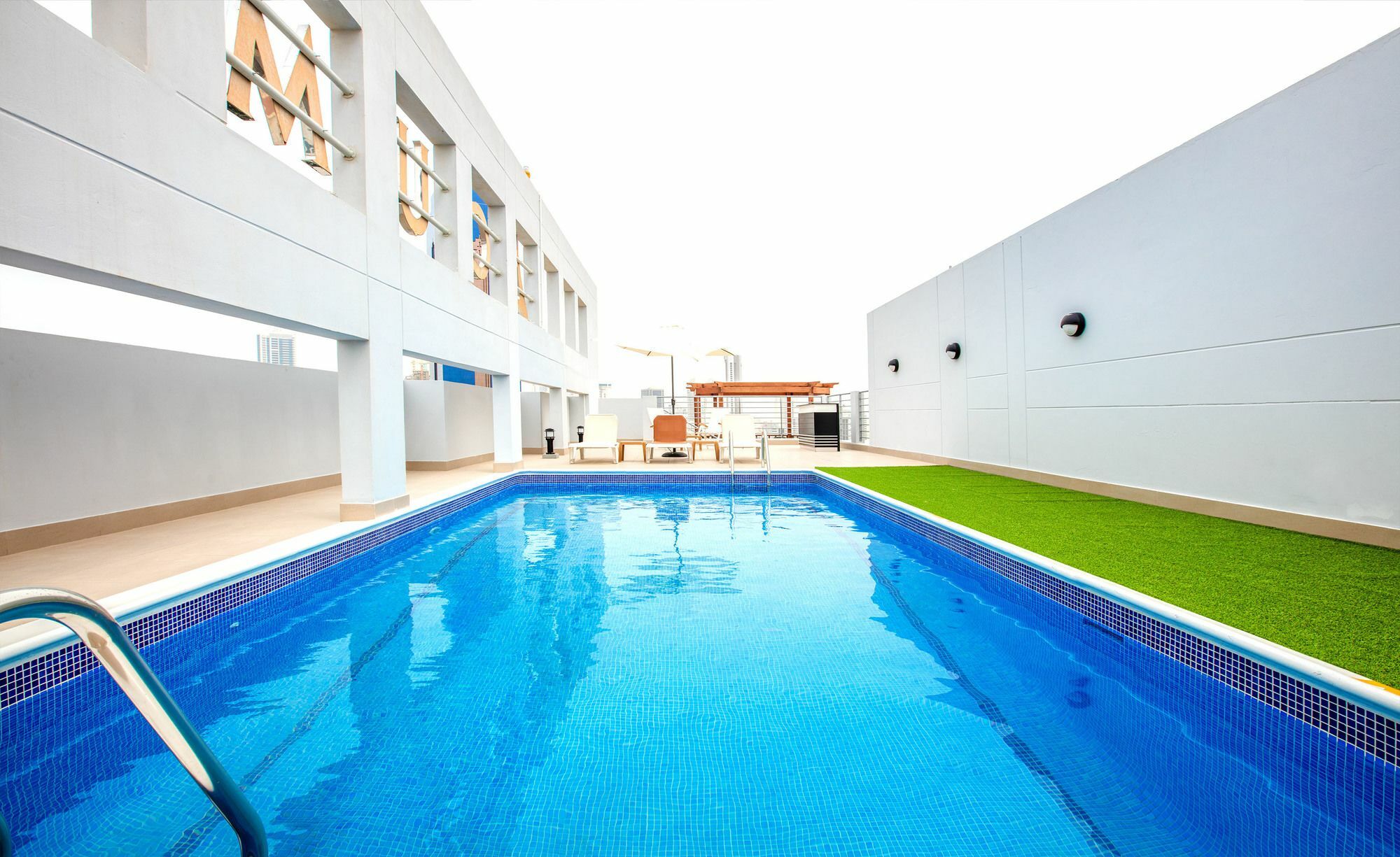 Loumage Suites And Spa Manama Exterior photo